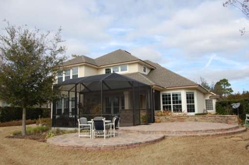 Back Yard Back of the house, patio, and lanai